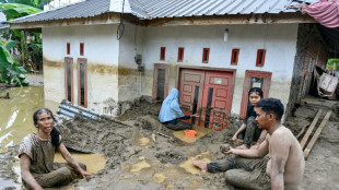 Thailand, Indonesia begin clean-up after massive floods kill hundreds