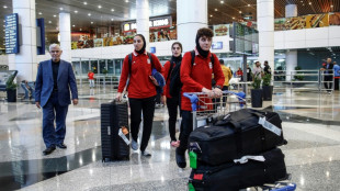 Three Iranian football team members leave asylum in Australia