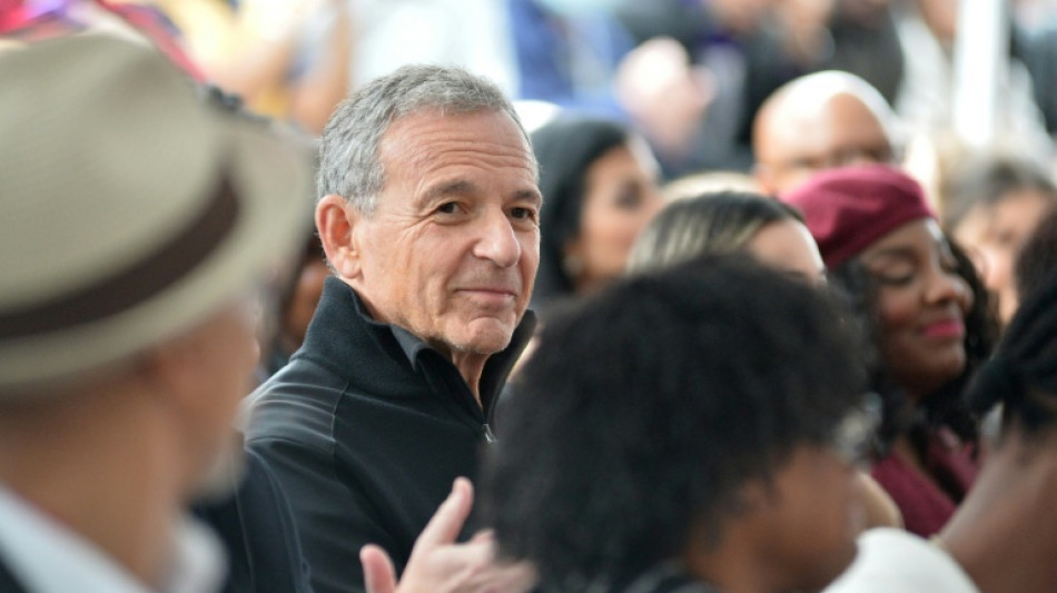 Disney earnings boosted by theme parks, as CEO handover nears