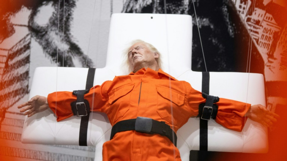 Sculpture of Trump strapped to a cross displayed in Switzerland