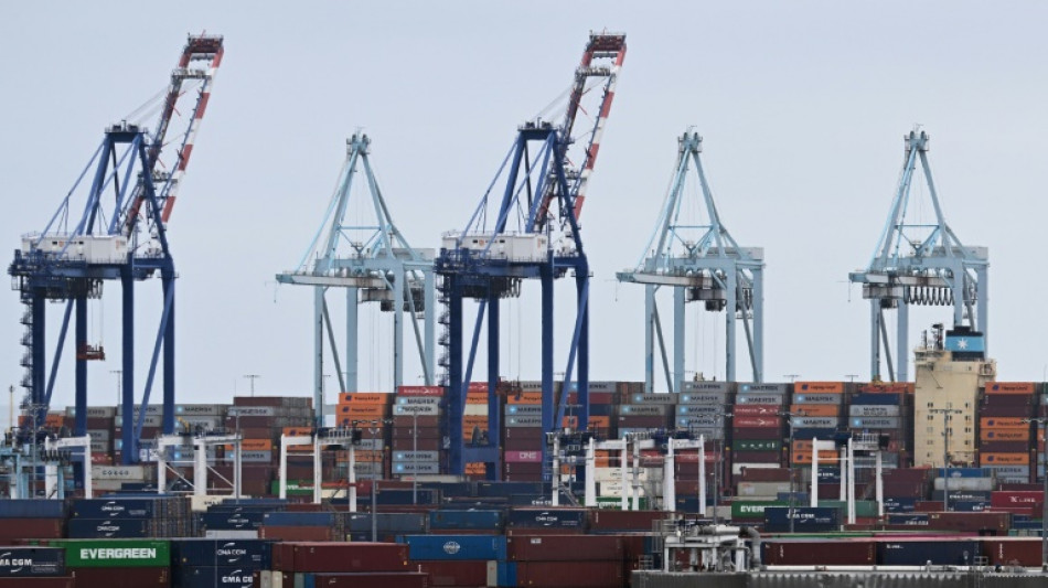 US economy shrinks, Trump blames Biden