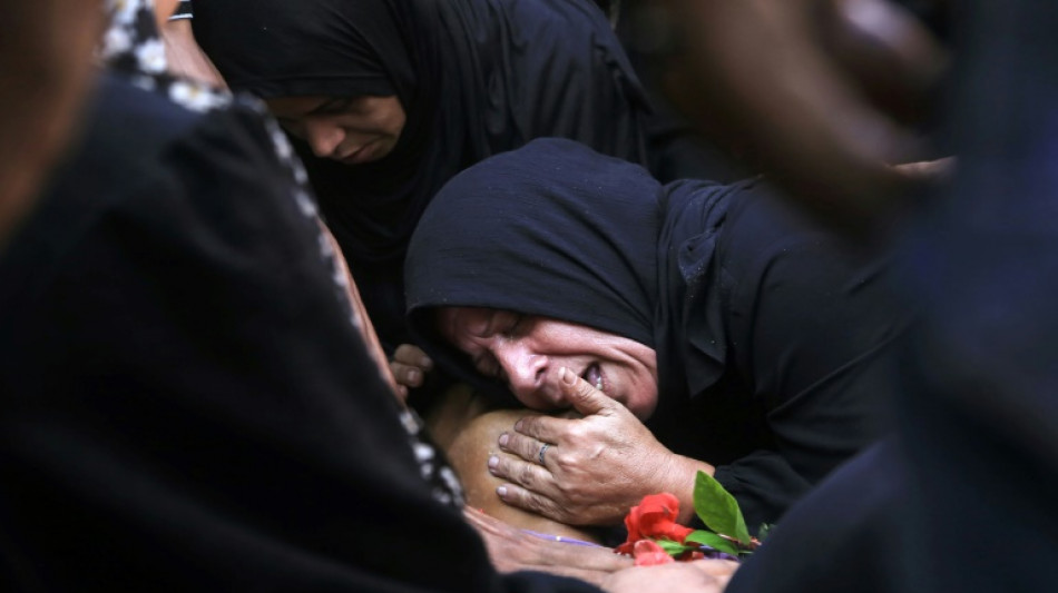 Gaza civil defence says Israeli fire kills 26 near two aid centres