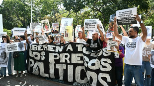 Venezuela moves to boost economy, amid anguish over pace of prisoner release