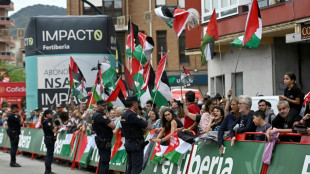 Ayuso sprints to Vuelta stage 12 victory as tensions ease