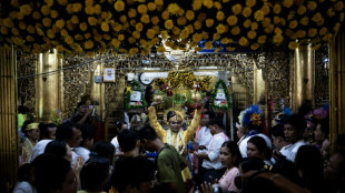 In war-split Myanmar 'spirit consorts' commune across divide