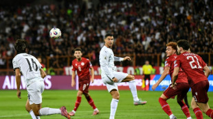 Poignant Portugal cruise, England unbeaten in World Cup qualifying