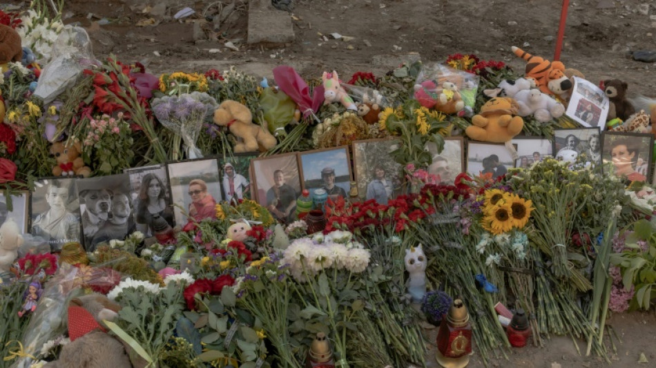 Kyiv buries soldier's wife and daughters killed in Russian attack