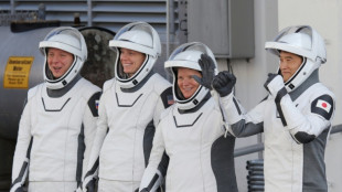 Five astronauts leave space station for trip back to Earth