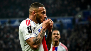 Lyon down Nice to boost Ligue 1 title bid with 13th straight win