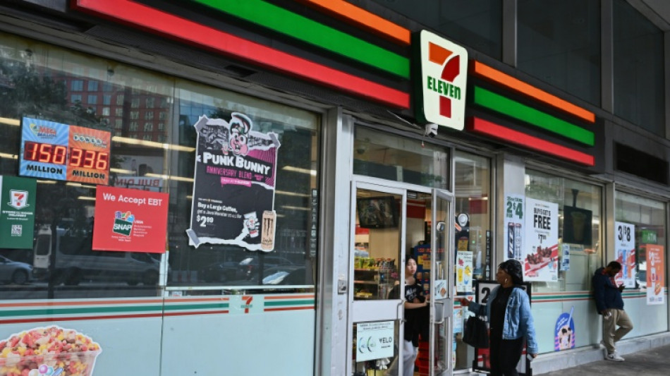 Asian stocks extend Wall St gains, 7-Eleven owner plunges