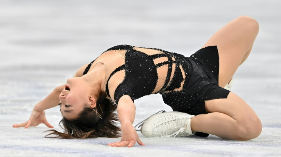 Japan's Sakamoto retains world figure skating title