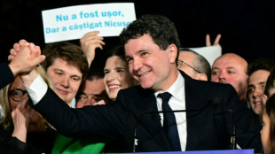 Pro-EU centrist wins tense Romania presidential vote rerun