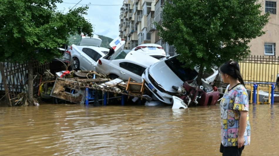 'Once in a hundred years': villagers clean up after deadly China floods