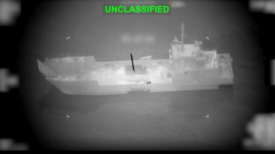 Cargo vessels hit as Iran threatens to close Gulf oil chokepoint