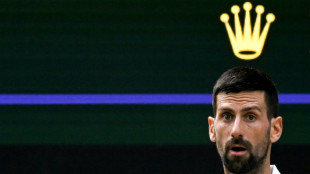 Djokovic battles past Cobolli to reach record 14th Wimbledon semi-final