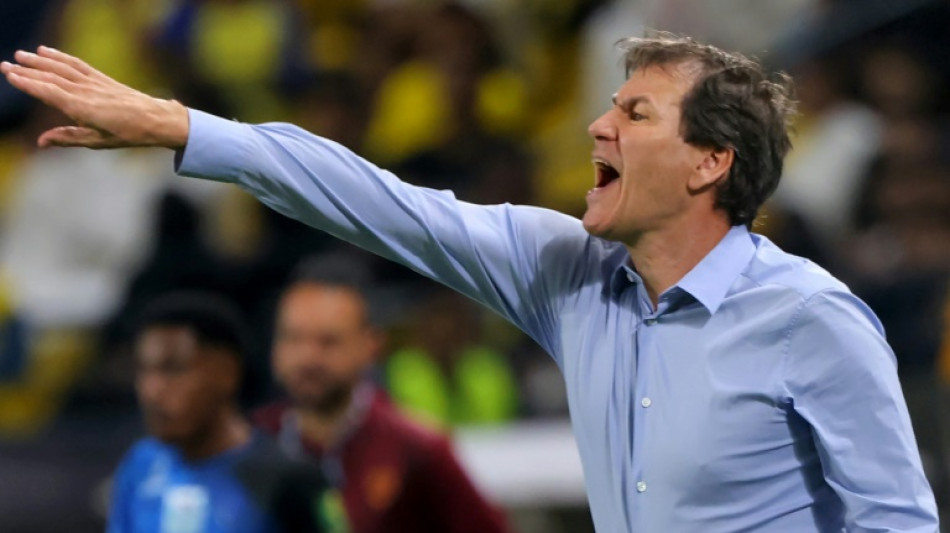 New boss Garcia plays down Napoli's Serie A title hopes