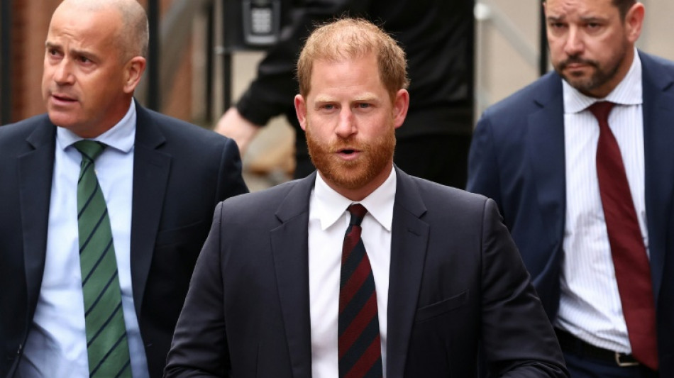 Prince Harry pays respects at grandmother's grave
