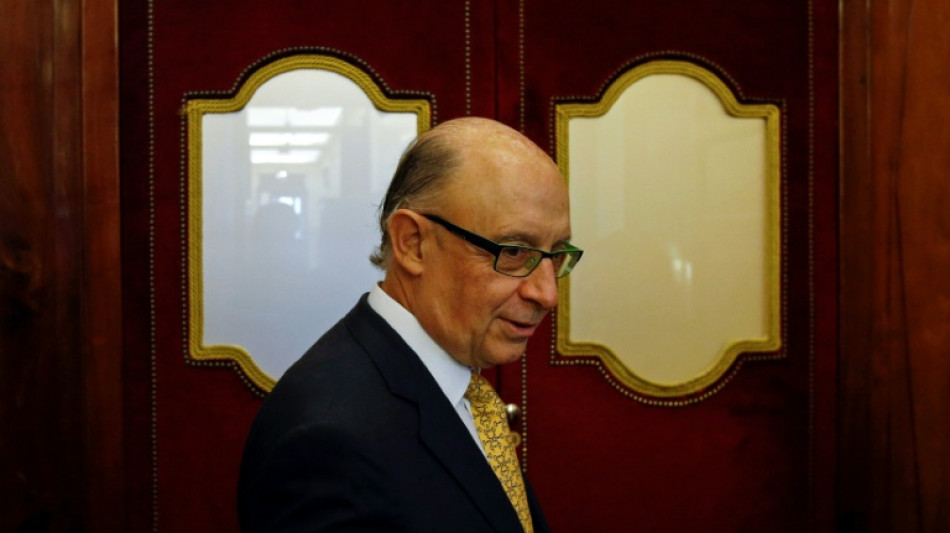 El exministro de Hacienda español del Gobierno de Rajoy (derecha) imputado por corrupción