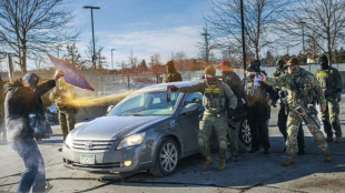 US sends more agents to Minneapolis despite furor over woman's killing