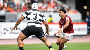 Mo'unga shrugs off broken hand to win Japanese title