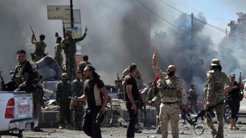 Syrian forces accused of 'executions' in Druze area as Israel launches strikes