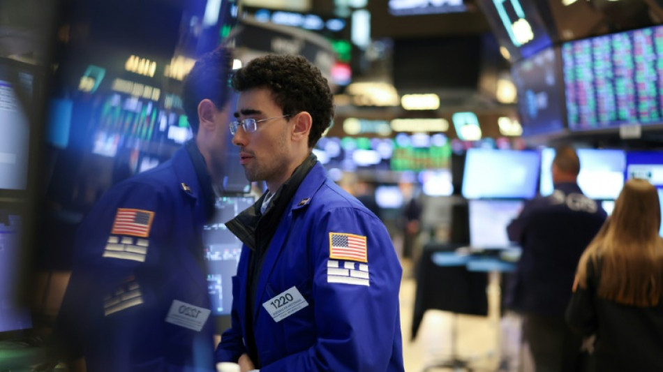 Wall Street termine en ordre dispers&eacute;, prudente avant les prix &agrave; la consommation