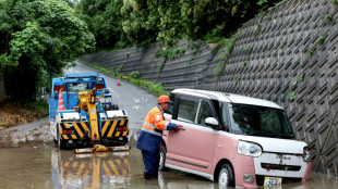 Floods kill two in Taiwan as twin storms approach Japan