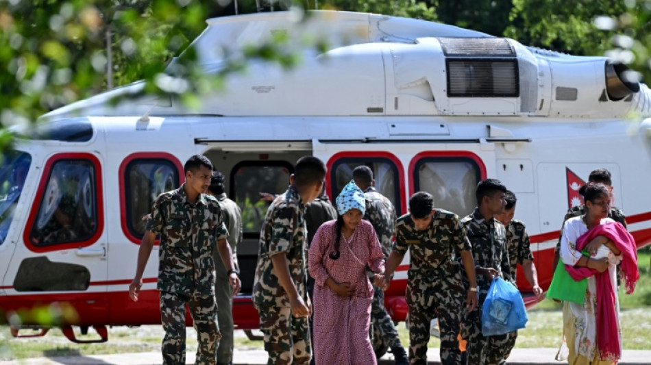 Nepal seeking to reach survivors in tunnel as risk of new floods rises