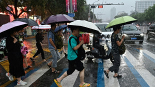 En Chine, des pluies torrentielles font au moins 30 morts, canicule &agrave; Shanghai