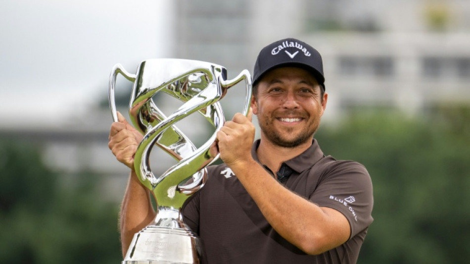 Schauffele battles doubts to end title drought in Japan